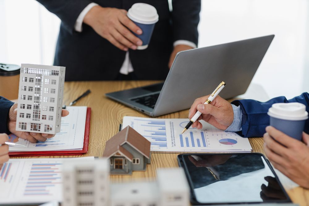 Business-meeting-of-real-estate-brokers-Business